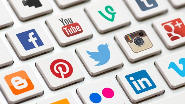 Modern Keyboard With Colored Social Network Buttons.